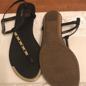 Black and gold thong sandals